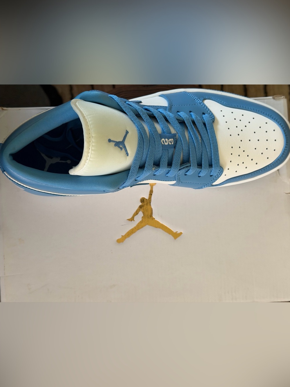 Jordan 1 Low Men’s Sneakers - White / Light Blue